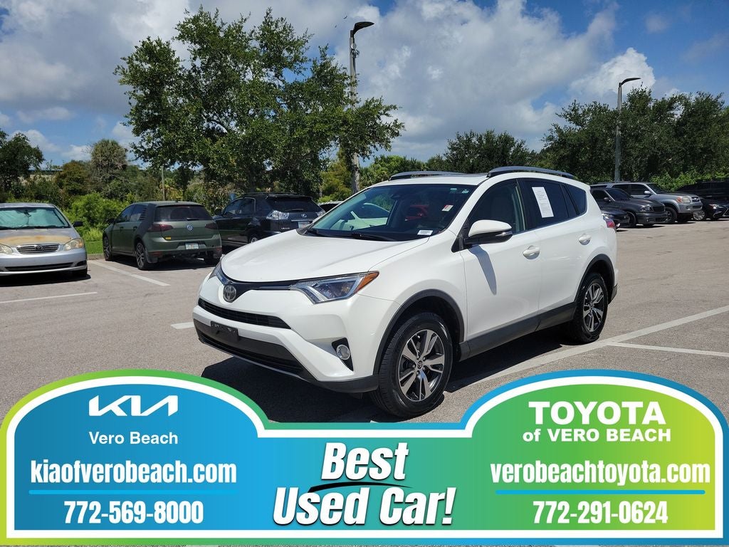 2018 Toyota RAV4 XLE in Super White — front three-quarter view